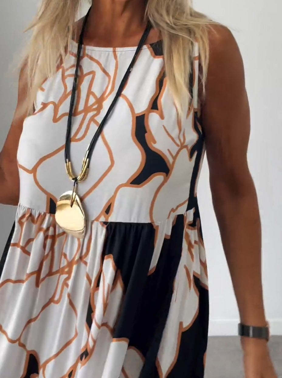 👗Τιράντες σε μπλε χρώμα με φλοράλ τύπωμα Maxivestito του 2024. 